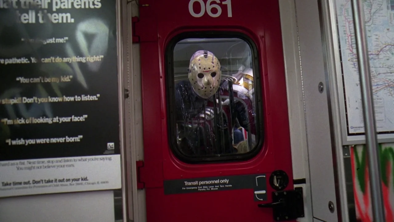 Friday the 13th Part VIII: Jason Takes Manhattan (1989) movie still: medium — A bright red door with a window serves as an interior barrier on a…