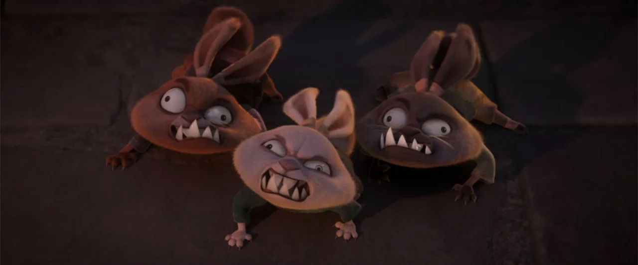 Kung Fu Panda 4 (2024) movie still: medium — A dark paved ground surface serves as the setting for three crouched figures. Three small…