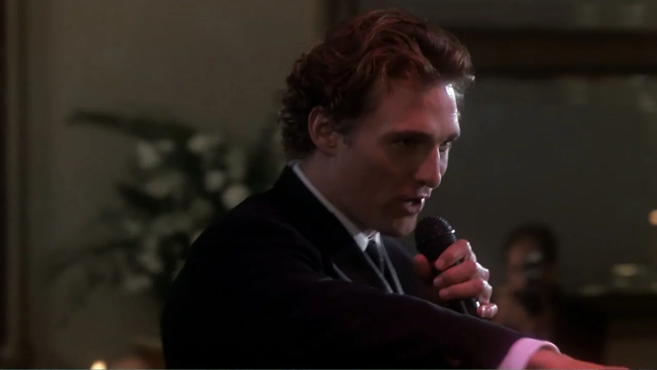 How to Lose a Guy in 10 Days (2003) movie still: medium — An interior space features dim ambient lighting and out-of-focus floral arrangements in…