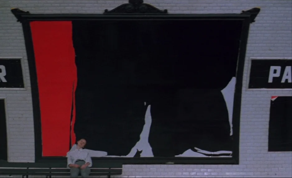 Mauvais Sang (Bad Blood) (The Night Is Young) (1986) movie still: wide — A subway platform features white rectangular tiles and a large black and…