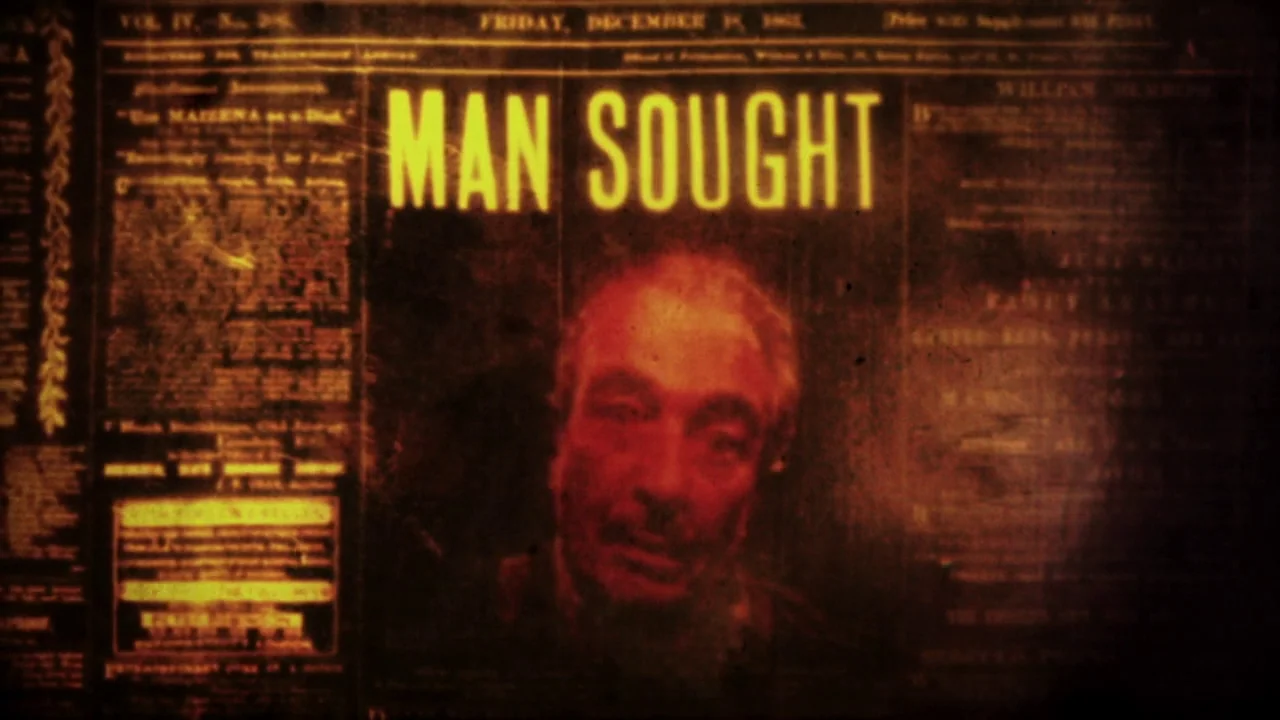 The Forbidden Room (2015) movie still: closeup — A dark, textured newspaper page from December 1865 features a portrait of a man. The headline above…
