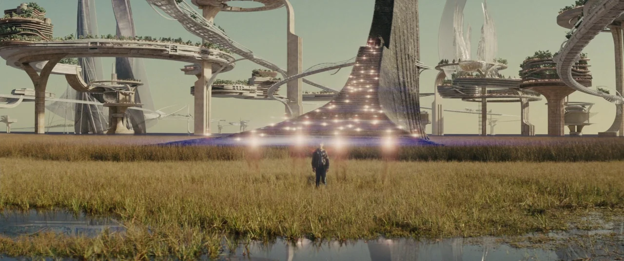 Midnight Special (2016) movie still: wide — A desolate field of tall grass sits before a massive, complex, futuristic architectural monument. A…
