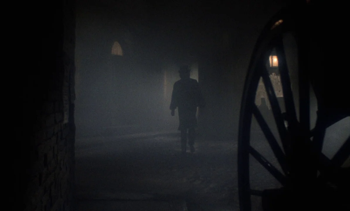 Dr Jekyll & Sister Hyde (1971) movie still: wide — A thick, pervasive fog hangs over a dark cobblestone path at night. A lone man in a long coat…