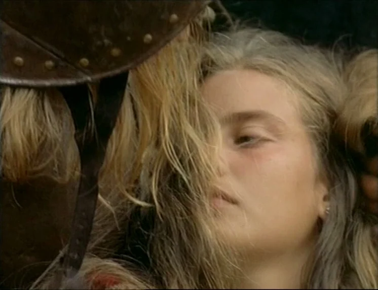 Aguirre, The Wrath Of God (Aguirre, der Zorn Gottes) (1972) movie still: closeup — A close-up captures a young woman's face partially obscured by…