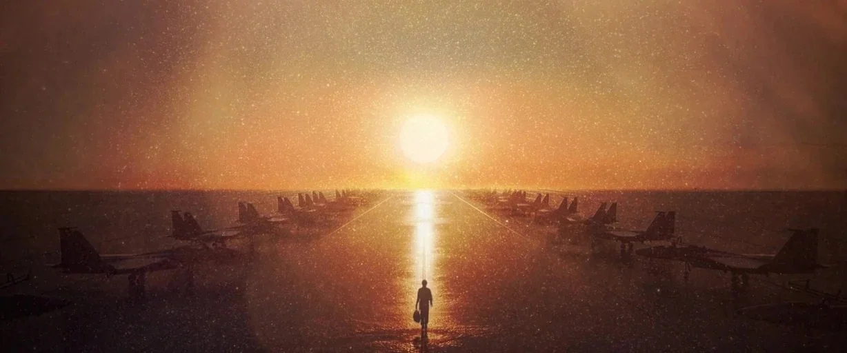 Captain Marvel (2019) movie still: wide — A vast airport runway stretches toward a bright sun at sunset. Rows of fighter jets are parked on both…