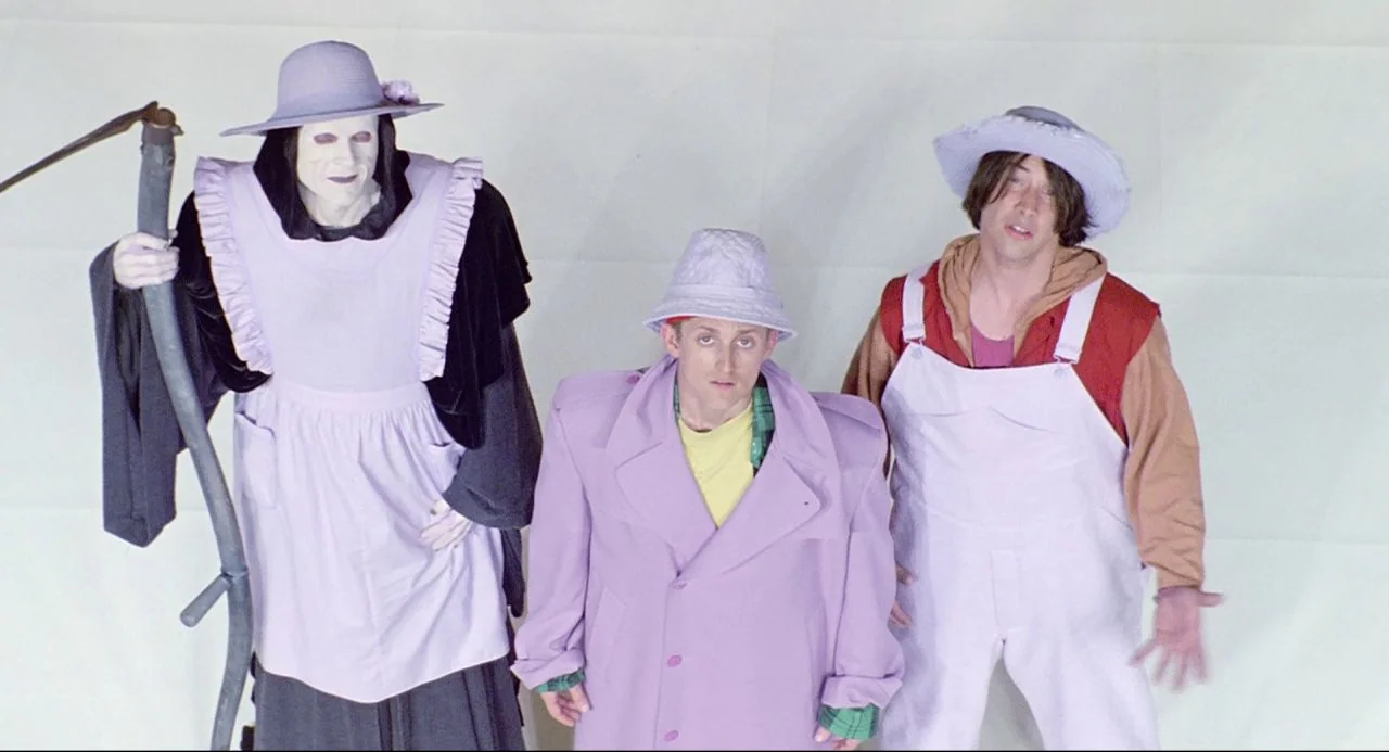Bill and Ted’s Bogus Journey (1991) movie still: fullbody — A stark white studio environment with no visible furniture or architectural details.…