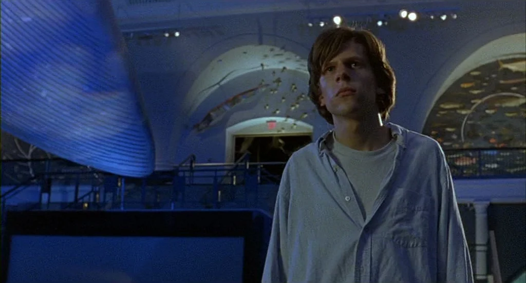 The Squid and the Whale (2005) movie still: medium — A high-ceilinged museum hall features arched architectural details and large illuminated…