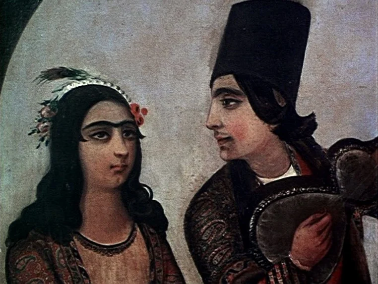 Ashik Kerib (1988) movie still: medium — A painted mural depicts a man and a woman in traditional Persian attire. The man plays a stringed…