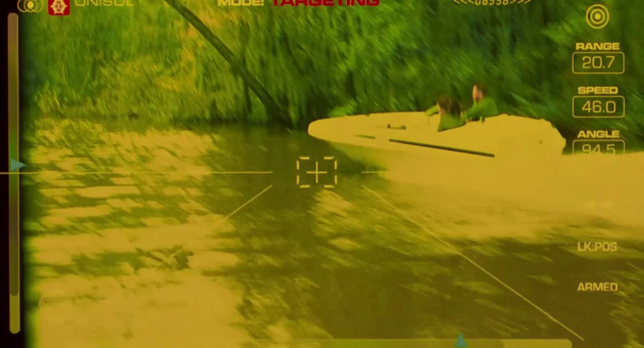 Universal Soldier: The Return (1999) movie still: wide — A waterway surrounded by dense green vegetation as seen through a digital targeting sight.…