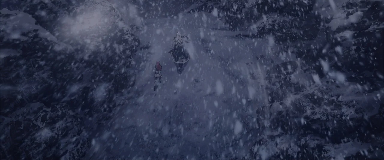 The Lord of the Rings: The War of the Rohirrim (2024) movie still: wide — A dark, snow-covered mountain pass is surrounded by jagged rock…