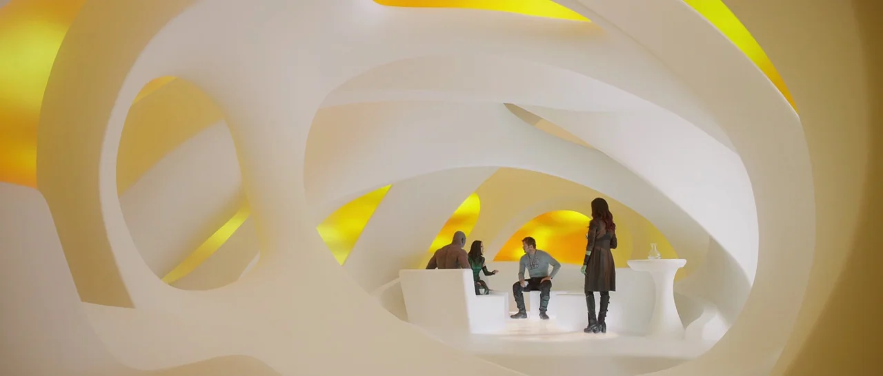 Guardians of the Galaxy Vol. 2 (2017) movie still: wide — A stark white futuristic interior features flowing organic wall curves and glowing yellow…