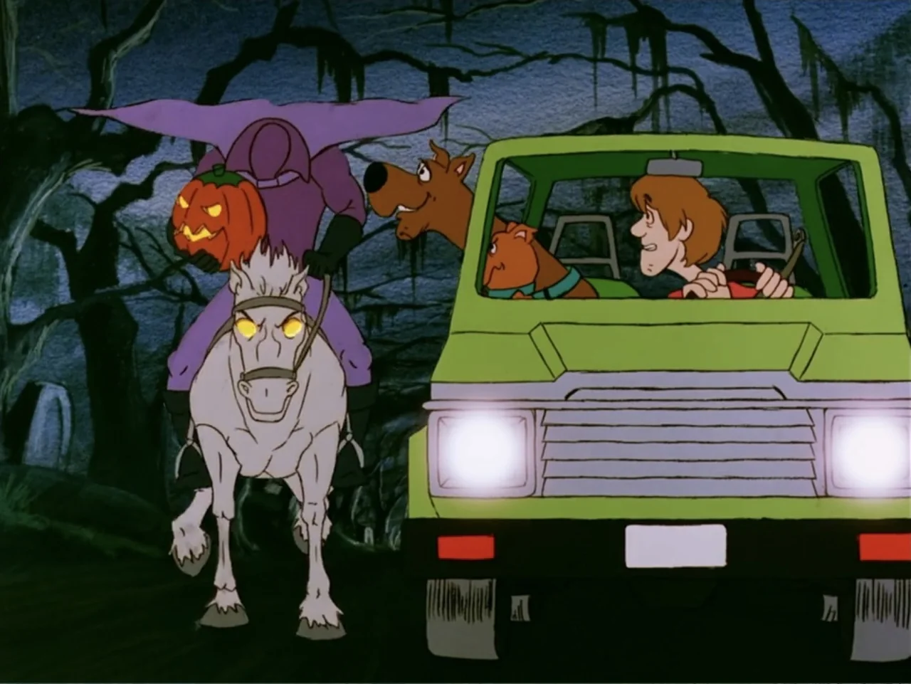 Scooby-Doo! Meets the Boo Brothers (1987) movie still: medium — A dark forest with skeletal trees serves as the backdrop for a nighttime chase. A…