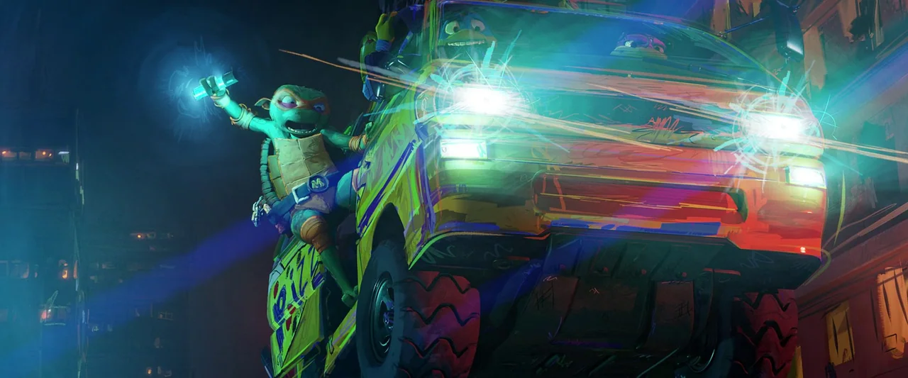 Teenage Mutant Ninja Turtles: Mutant Mayhem (2023) movie still: medium — A stylized urban night setting features a painted pizza van driving down a…