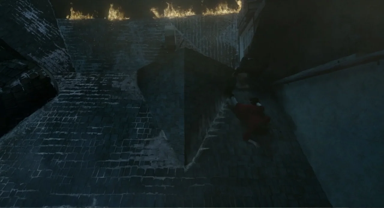 Orphan: First Kill (2022) movie still: wide — A dark stone roof slopes steeply beneath a wall lined with burning fire pits. A person in a red coat…