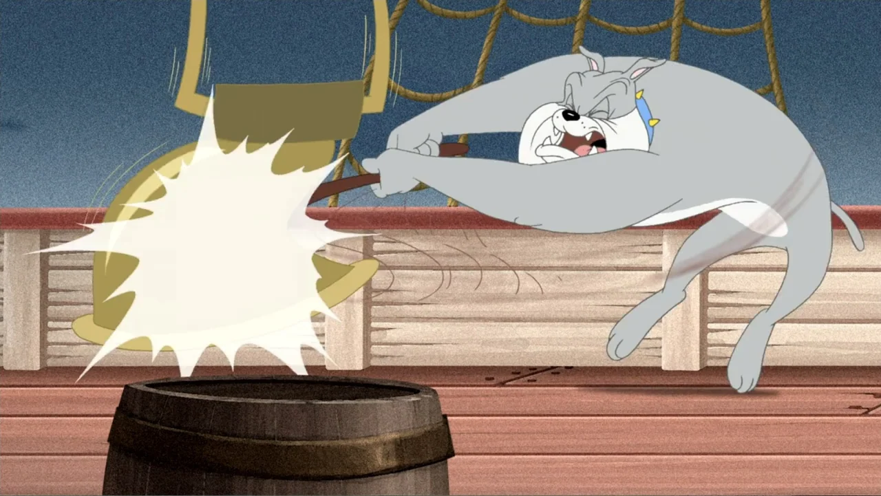 Tom and Jerry: Shiver Me Whiskers (2006) movie still: medium — A wooden ship deck with a barrel and ropes in the background. An animated grey…