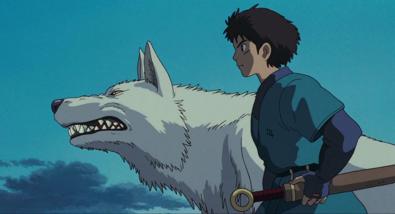Princess Mononoke (1997) movie still: medium — A clear blue sky forms the backdrop for a young man and wolf. The man grips a sword hilt while the…