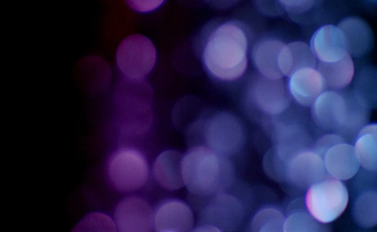 Blood And Black Lace (1964) movie still: closeup — An abstract composition of out-of-focus circular light patches creates a blurred pattern. The…