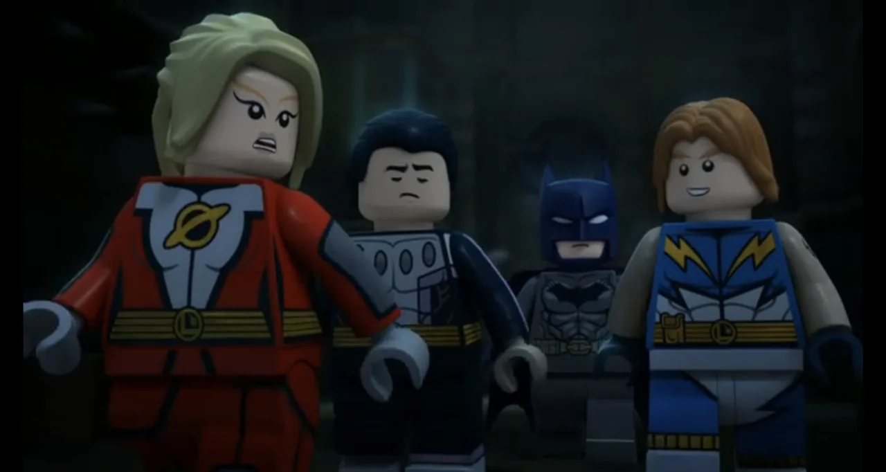 LEGO DC Comics Super Heroes: Justice League - Cosmic Clash (2016) movie still: medium — Four stylized lego characters stand close together in a…