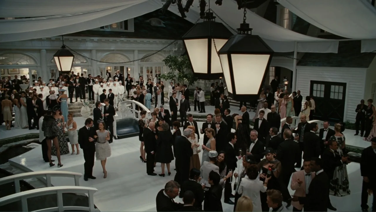 Sex and the City 2 (2010) movie still: wide — A spacious outdoor reception area features white flooring, white fabric overhead drapes, and elegant…