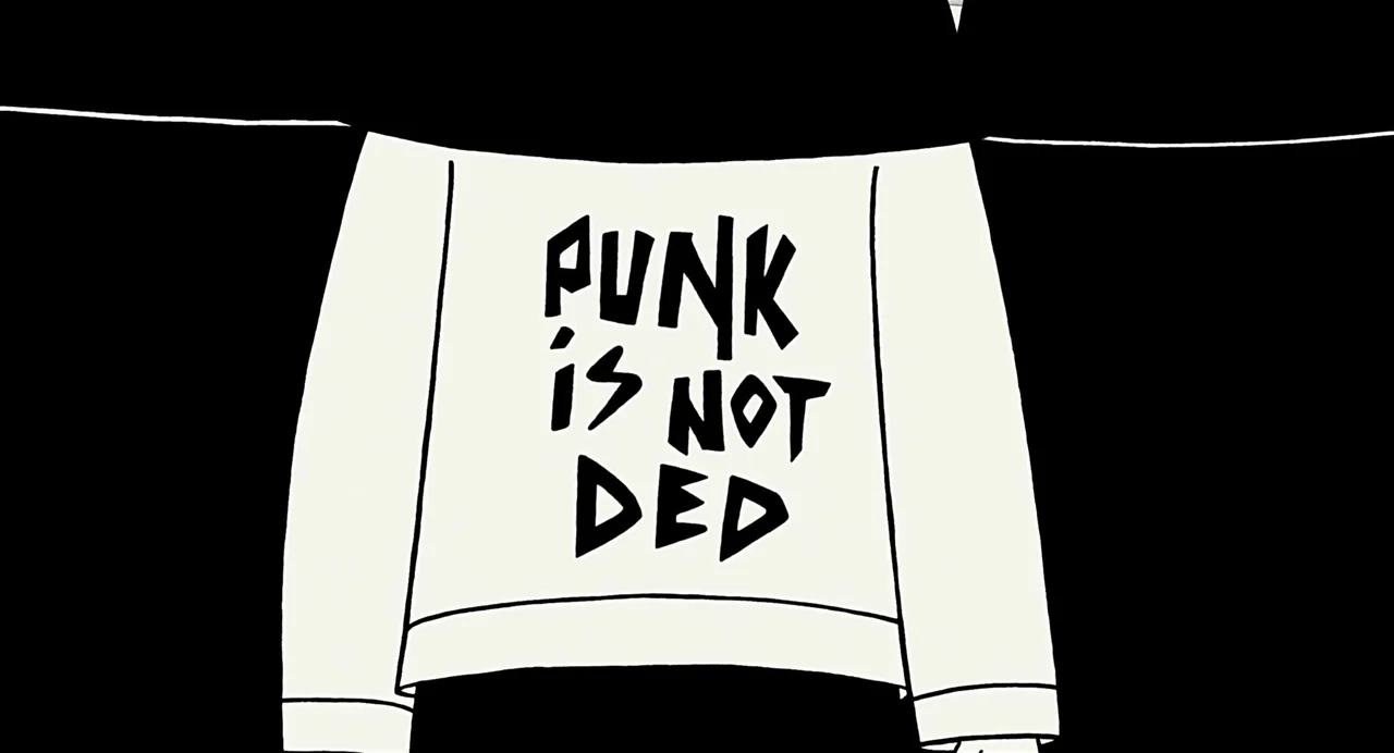 Persepolis (2007) movie still: closeup — A stark white sweatshirt features black hand-lettered text on its back panel. The garment is isolated…