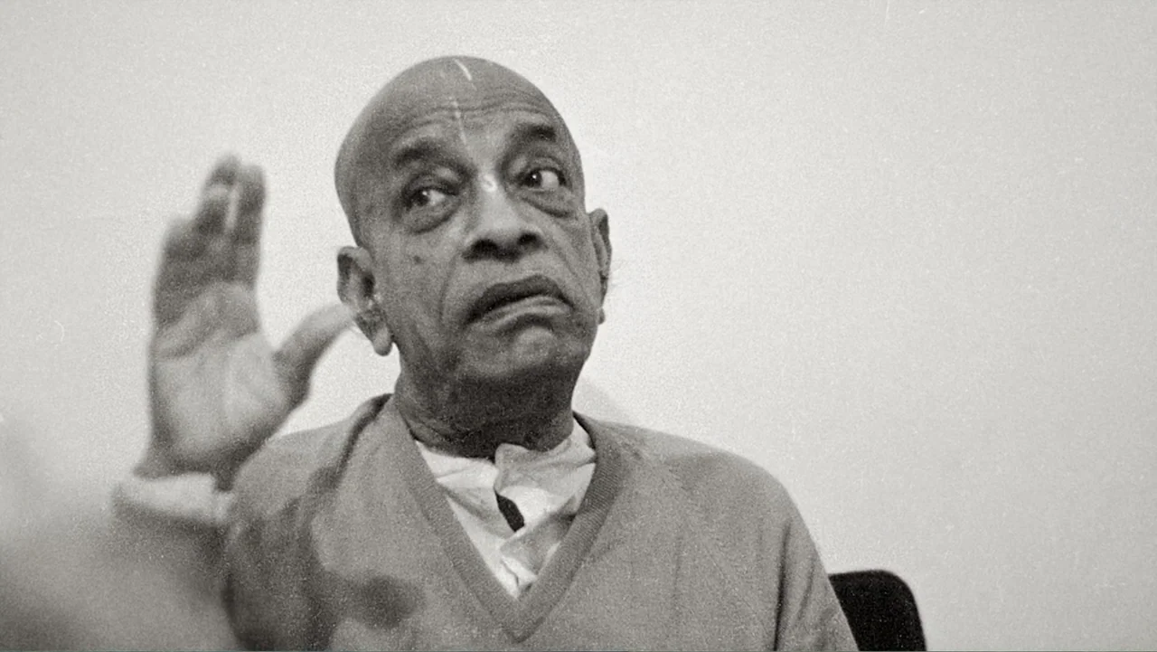 Hare Krishna! The Mantra, the Movement and the Swami Who Started It All (2017) movie still: closeup — An indoor space with a plain, light-colored…