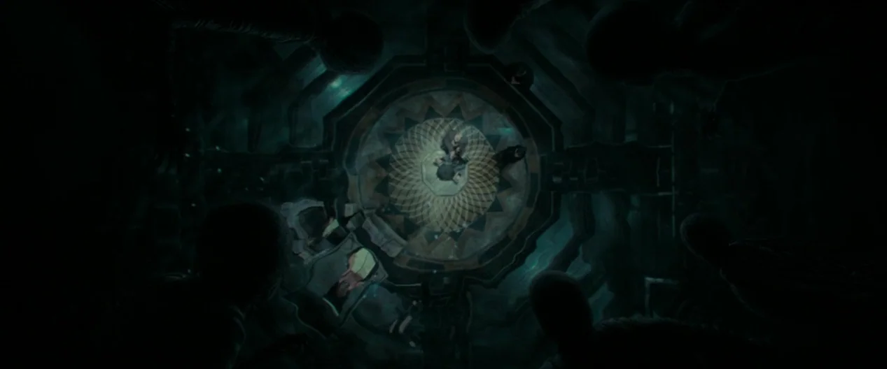 Harry Potter & The Deathly Hallows Part 1 (2010) movie still: wide — A dark subterranean chamber features a circular floor design with a central…