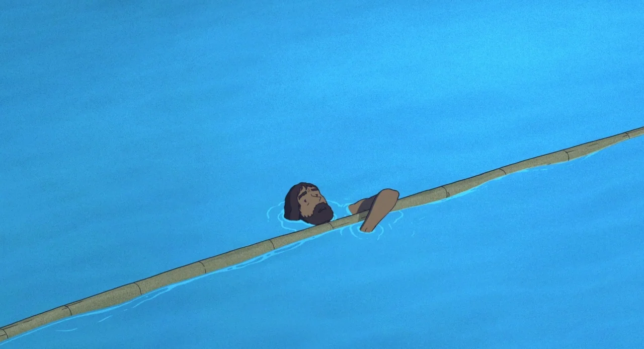 The Red Turtle (2016) movie still: wide — Vast expanse of bright blue water stretching across the entire frame. A man floats in the water while…