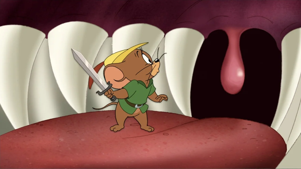 Tom and Jerry: Robin Hood and His Merry Mouse (2012) movie still: medium — A cartoon mouse stands upon a giant tongue inside an open mouth. The…