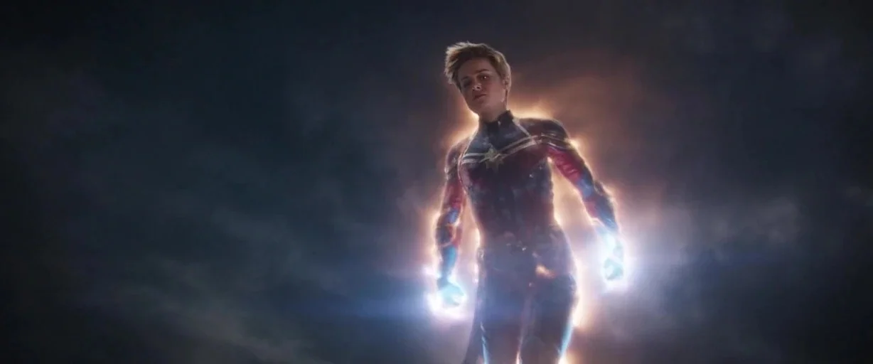 Avengers: Endgame (2019) movie still: fullbody — A dark night sky filled with turbulent clouds provides a backdrop for a hero. The character floats…