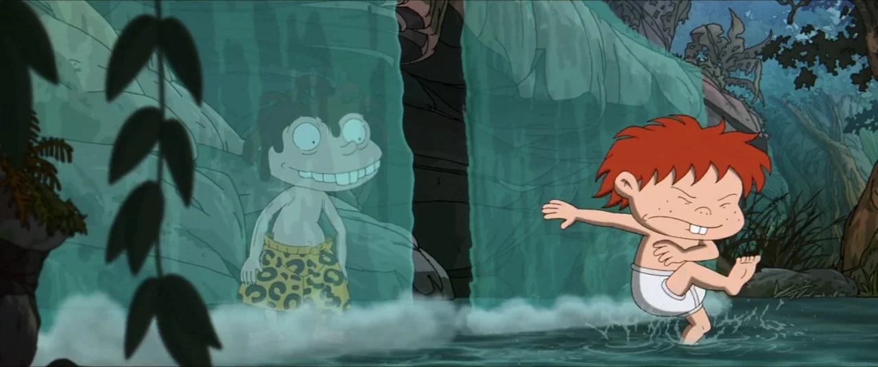 Rugrats Go Wild (2003) movie still: medium — A cartoon forest stream flows in front of a translucent waterfall. Two young boys play in the water on…