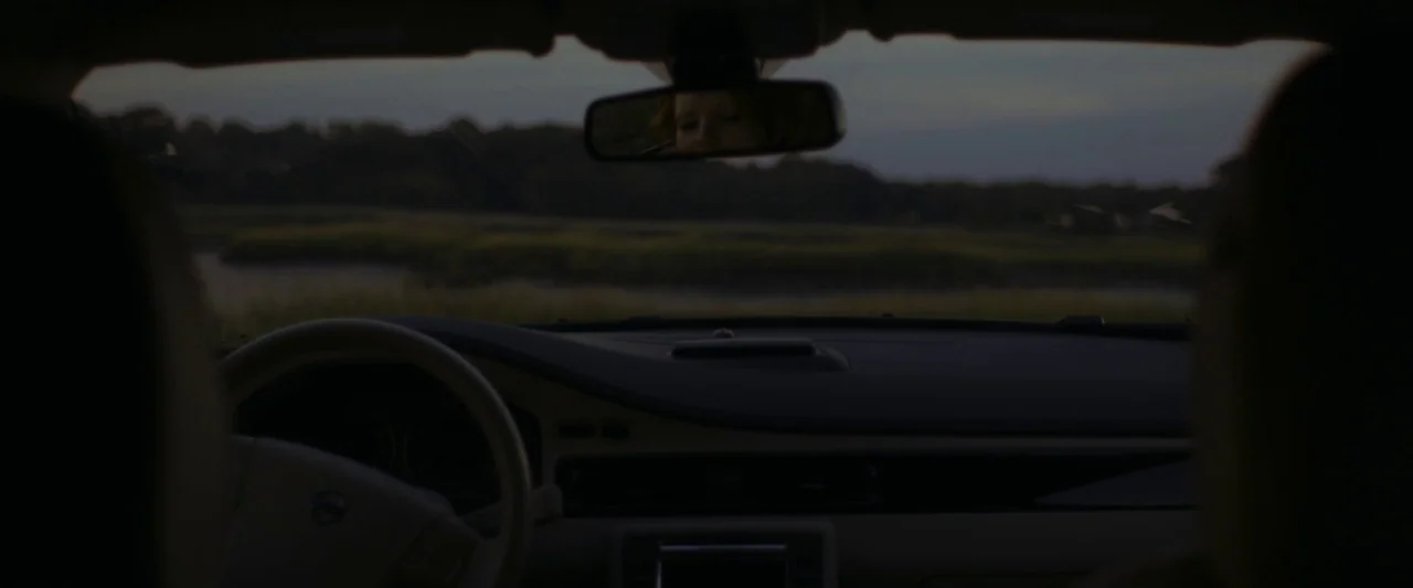 The Disappearance of Eleanor Rigby: Her (2014) movie still: medium — The interior of a parked car shows the dashboard, steering wheel, and front…
