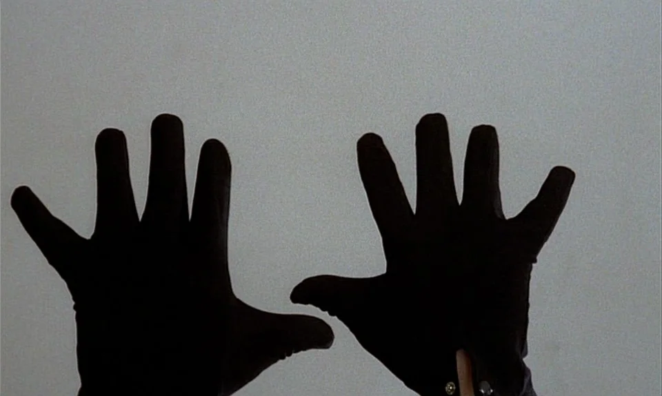 Successive Slidings of Pleasure (Glissements progressifs du plaisir) (1974) movie still: closeup — A featureless, light-colored surface serves as a…