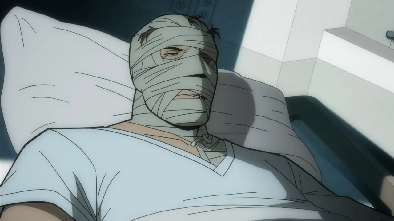 Batman: The Long Halloween, Part Two (2021) movie still: closeup — A sterile medical room features a patient resting in a bed with white linens. The…