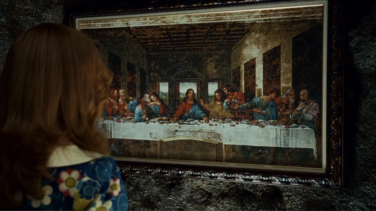 Epic Movie (2007) movie still: medium — A dimly lit interior space features a large framed print of The Last Supper. A person with wavy…