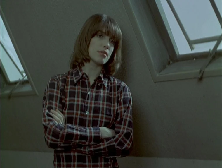 Love In The Afternoon (Chloe In The Afternoon) (L’amour l’après-midi) (1972) movie still: medium — An interior space with angled walls and two large…