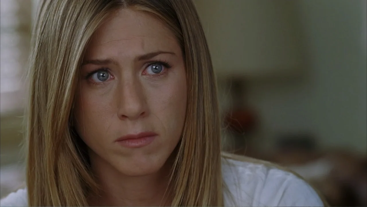 Rumor Has It... (2005) movie still: closeup — An interior space features soft-focus background textures and neutral color tones. A woman with blonde…