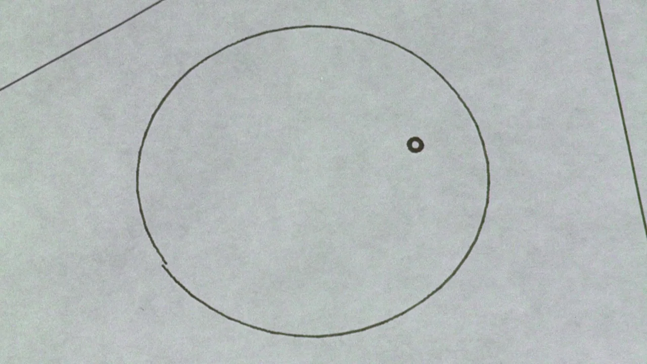 Phase IV (1974) movie still: closeup — A light gray background contains a thin black circle with a small dot inside. The drawing is minimalist with…