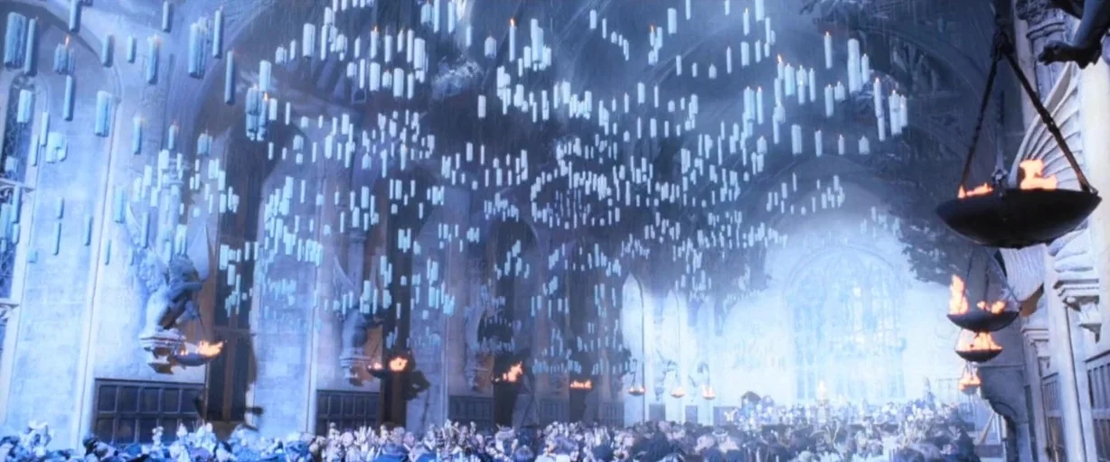 Harry Potter and the Goblet of Fire (2005) movie still: establishing — A vast stone hall features vaulted ceilings and intricate gothic…