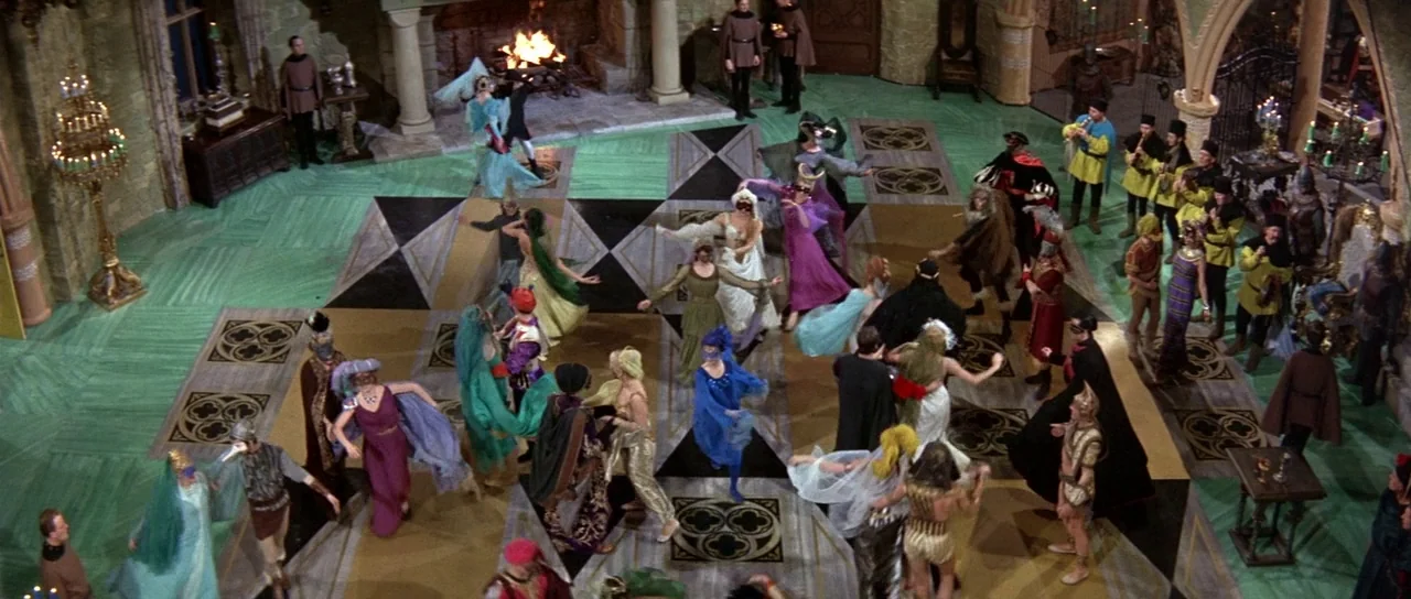 The Masque of the Red Death (1964) movie still: wide — A grand medieval ballroom with a patterned tiled floor and stone archways.