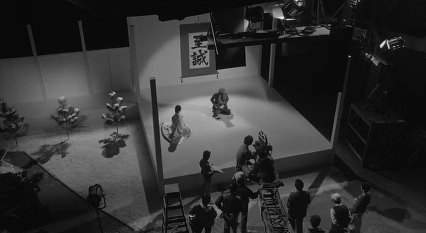 Mishima: A Life in Four Chapters (1985) movie still: wide — A film production studio set displays a Japanese-themed scene with artificial snow and…