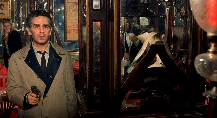 Perversion Story (1969) movie still: medium — An interior space features wood paneling and decorative mirrors surrounding the primary subject. A…