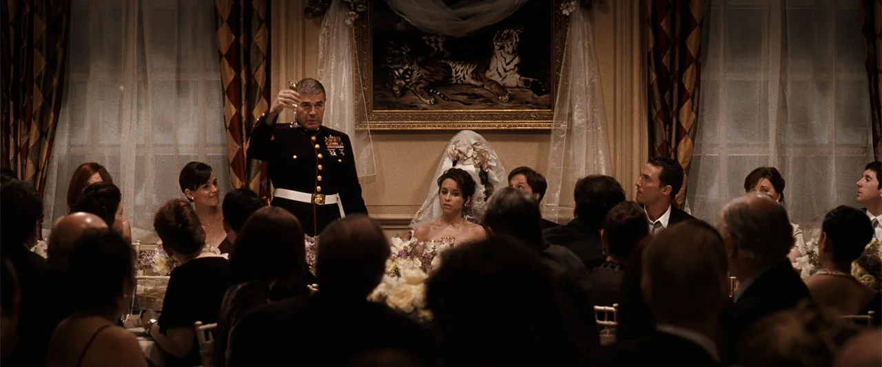 Ghosts of Girlfriends Past (2009) movie still: medium — A formal wedding reception held in a decorated indoor room with a tiger painting. An older…