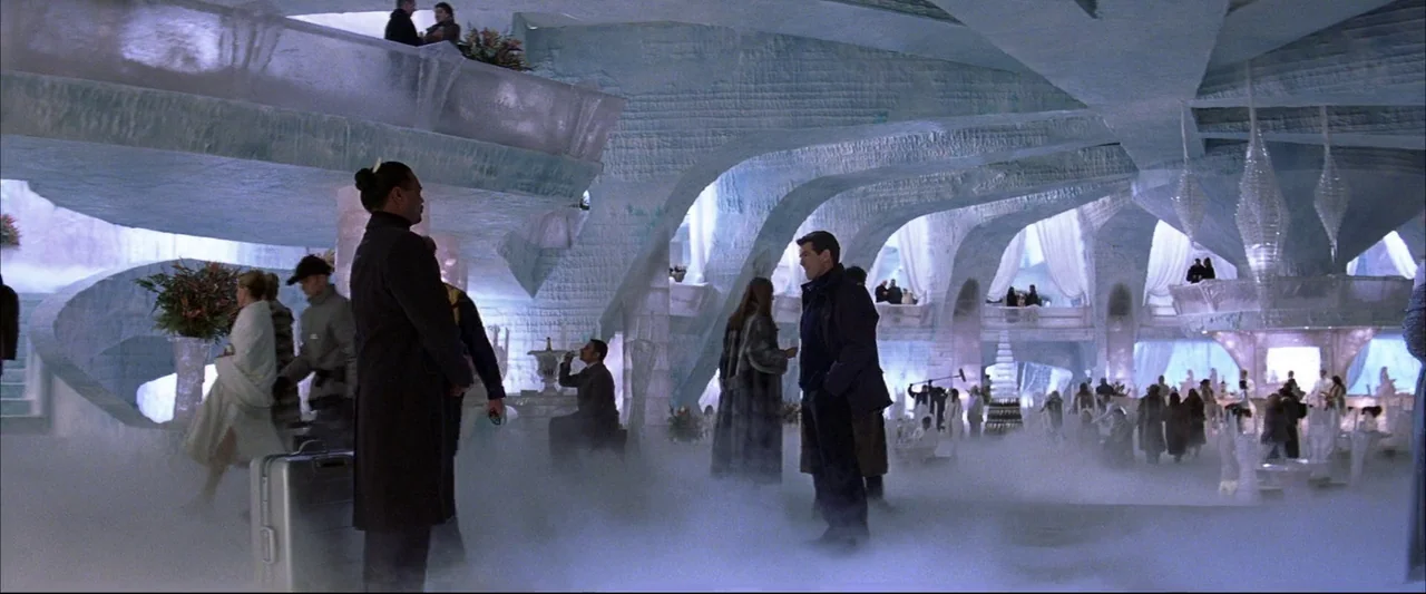 Die Another Day (2002) movie still: wide — A spacious hall constructed entirely from sculpted ice blocks featuring grand archways and columns.…