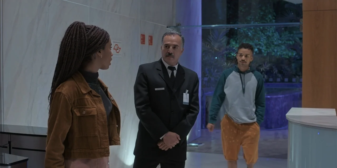 An Unforgettable Year - Autumn (2023) movie still: fullbody — A modern hotel lobby features marble walls and a reception desk with glass elements. A…