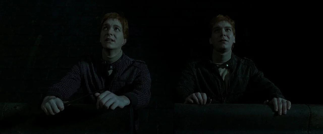 Harry Potter & The Deathly Hallows Part 2 (2011) movie still: medium — Two men stand on a dark rooftop with a tiled background at night. They look…