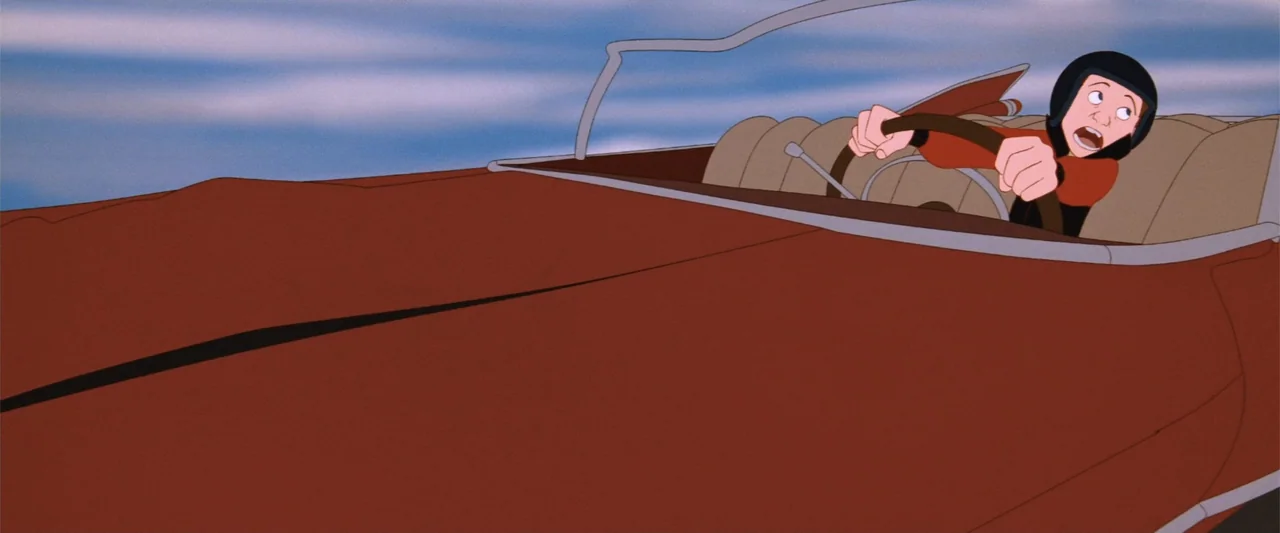 The Iron Giant (1999) movie still: medium — A cartoon 2D view of a red convertible driving against a simple blue sky. A young boy in a helmet sits…
