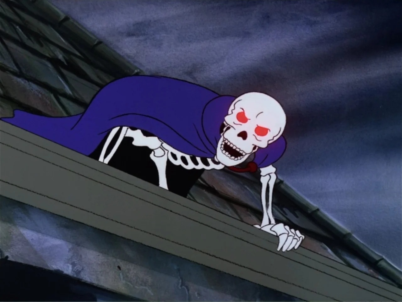 Scooby-Doo! Meets the Boo Brothers (1987) movie still: medium — A cartoon skeleton crawls across the shingled surface of a dark residential roof.…