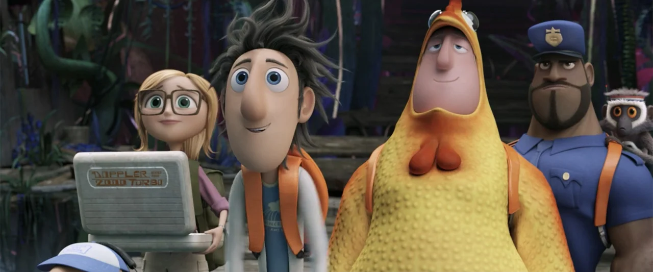 Cloudy with a Chance of Meatballs 2 (2013) movie still: medium — A group of animated characters stands in a lush outdoor jungle environment. They…