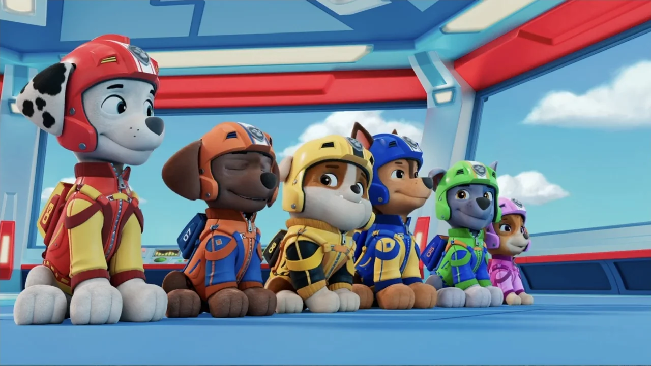 PAW Patrol: Air Rescue (2025) movie still: medium — The interior of a high-tech command center features wide windows looking out at clouds. Six…