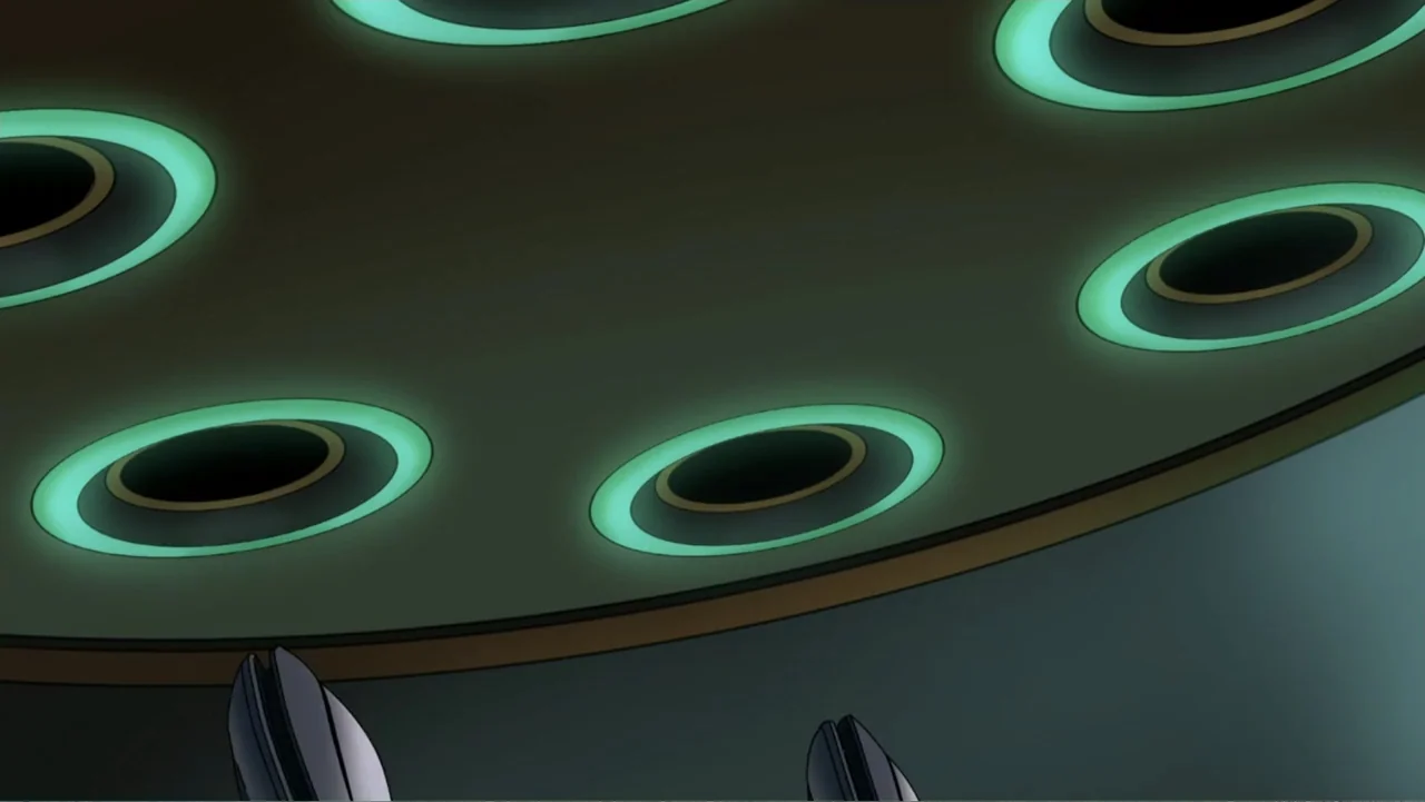 Legion of Super-Heroes (2023) movie still: establishing — A dark, metallic ceiling interior features several circular portals with glowing green…